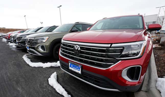 A line of unsold 2024 Atlas sports-utility vehicles sits at a Volkswagen dealership Sunday, March 17, 2024, in Denver. Most automakers who sell new vehicles in the U.S. report first-quarter sales numbers on Tuesday, April 2, 2024. Sales are expected to be surprisingly strong despite high interest rates. (AP Photo/David Zalubowski)