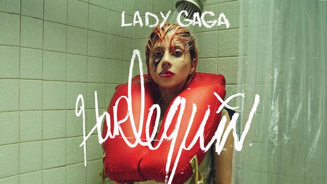 Lady Gaga stands in a shower wearing a life vest on her new album cover.