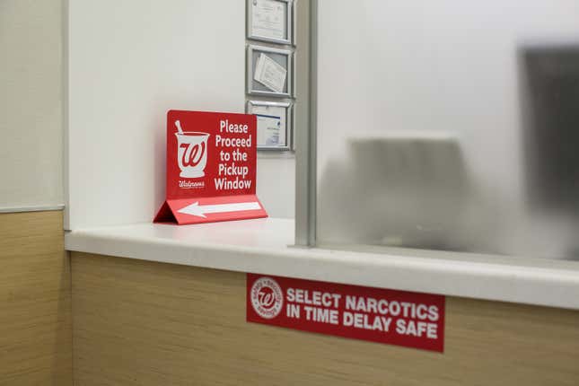 Pharmacy signs at a Walgreens in Los Angeles, California. 