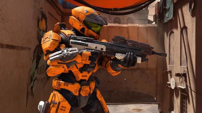 an orange spartan 7 holding an assault rifle on the halo infinite map bazaar