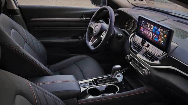 A photo of the driver seat and steering wheel in the new Nissan Altima.