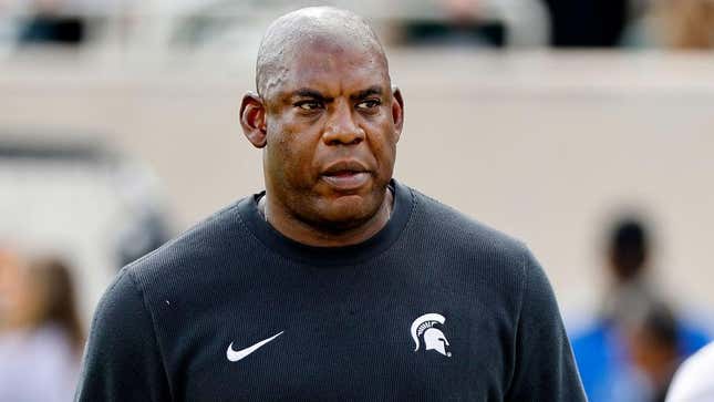 Image for article titled This Former Michigan State Football Coach Wants His Money Back