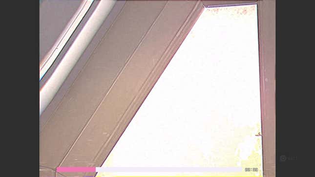 A screenshot shows a water tower from the perspective of a camcorder.