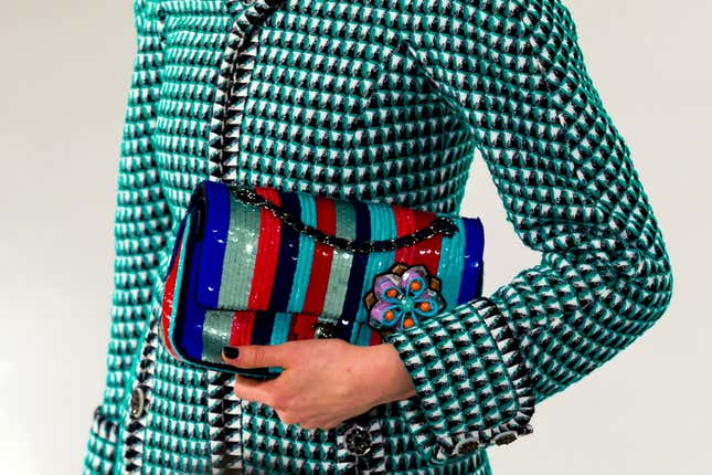 A model presents a creation of the Chanel Cruise Collection 2015/16 at the Dongdaemun Design Plaza in Seoul, May 4, 2015. French fashion house Chanel looked to traditional South Korean dress for its 2015/2016 cruise collection, unveiling a colourful inter-seasonal line at a catwalk show in Seoul on Monday.