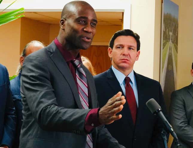Florida Surgeon General Joseph Ladapo and Gov. Ron DeSantis at a news conference in West Palm Beach, Florida, on Jan. 6, 2022. 