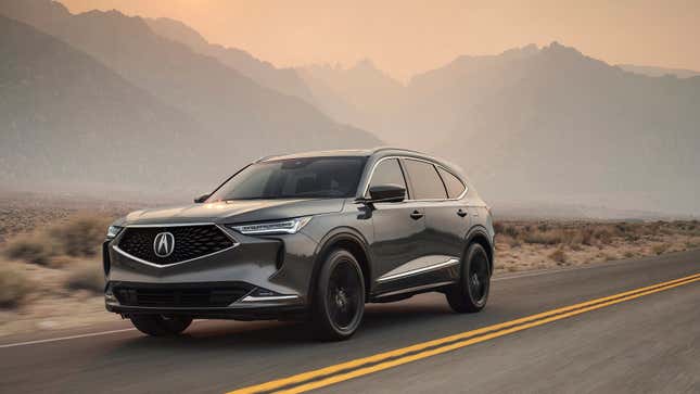 A photo of a silver 2023 Acura MDX. 