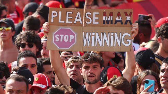 A fan holds a sign hoping for Max Verstappen of the Netherlands and Oracle Red Bull Racing to stop winning during the F1 Grand Prix of Italy at Autodromo Nazionale Monza on September 03, 2023 in Monza, Italy