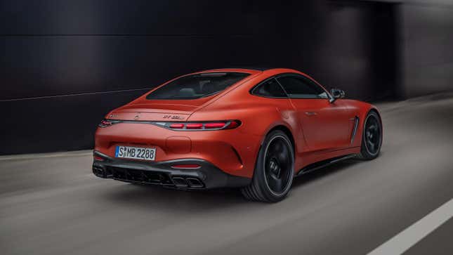 Rear 3/4 view of an orange Mercedes-AMG GT63 coupe