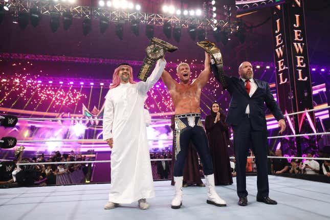 Paul "Triple H" Levesque presents the Crown Jewel Men's Championship to Cody Rhodes during Crown Jewel at Mohammed Abdo Arena on November 2, 2024 in Riyadh, Saudi Arabia.