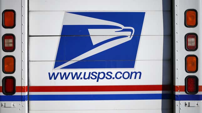 A United States Postal Service (USPS) mail delivery vehicle outside a post office in Louisville, Kentucky, US, on Sunday, July 3, 2022.