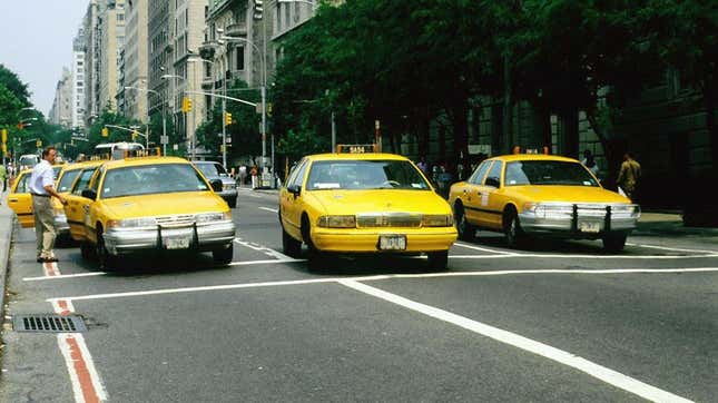 Yellow cabs at 5th Avenue. Manhattan, N.Y.C., New York, United States in 1997