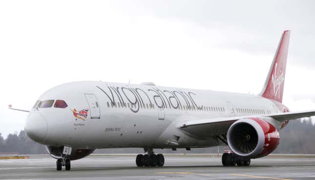 FILE - A Virgin Atlantic Boeing 787-9 passenger airplane arrives following a flight from London to Seattle, March 27, 2017, at Seattle-Tacoma International Airport in Seattle. The first commercial airliner to cross the Atlantic on a purely high-fat, low-emissions diet flew Tuesday Nov. 28, 2023 from London to New York in a step toward achieving what supporters dubbed as “jet zero.&quot; (AP Photo/Ted S. Warren, File)