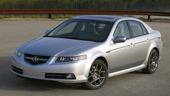 A photo of a silver Acura TL sedan. 