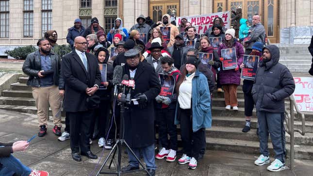 Rev. Timothy McDonald speaks alongside Housing Justice League and the family of Cornelius Taylor in a press conference calling for the city to stop encampment clearings. (Stephannie Stokes/WABE)