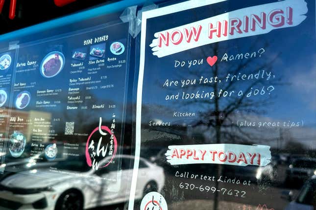 A hiring sign is displayed at a restaurant in Glenview, Ill., Monday, Jan. 29, 2024. On Thursday, Feb. 1, 2024, the Labor Department reports on the number of people who applied for unemployment benefits last week.(AP Photo/Nam Y. Huh)