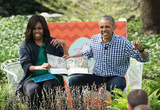 US President Barack Obama and First Lady Michelle Obama read Maurice Sendak’s “Where the Wild Things Are” to children at the annual Easter Egg Roll at the White House in Washington, DC, on March 28, 2016.