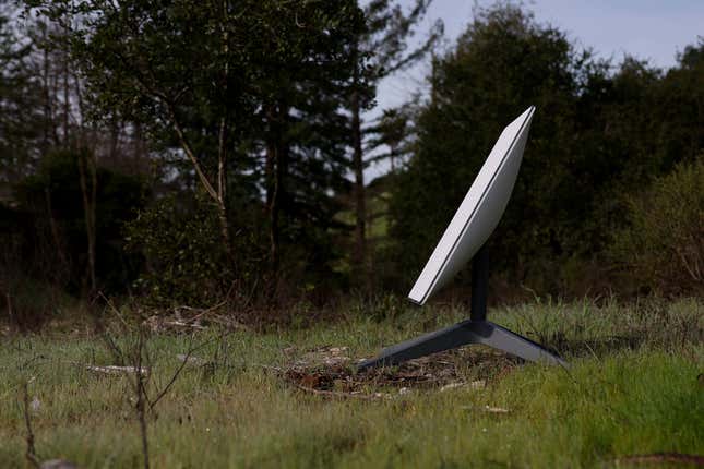 Starlink dish in a grassy field