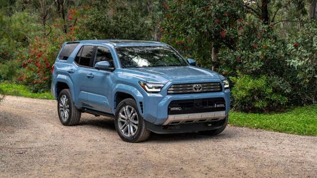 A blue Toyota 4Runner on a gravel road