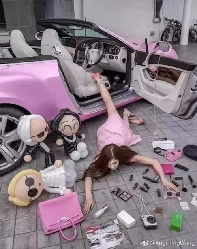 A woman laying on the ground with lipsticks and luxury bags around her.