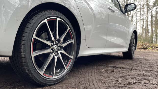 A photo of the wheels on a white Toyota Yaris GR Sport. 