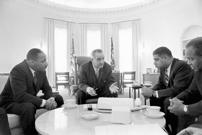 Lyndon Baines Johnson (1908-1973) 36th President of the United States in talks with Civil Rights leaders in the White House, including Martin Luther King, Jr (1929-1968), left