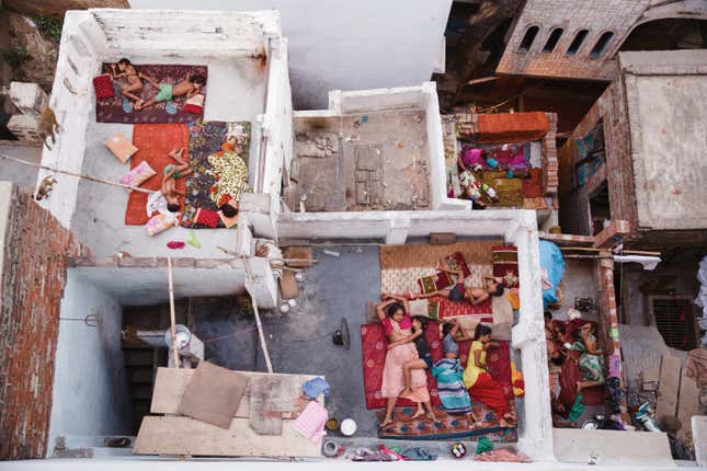 Rooftop Dreams, Varanasi. People category, second place. (National Geographic Travel Photographer of the Yea/Yasmin Mund)