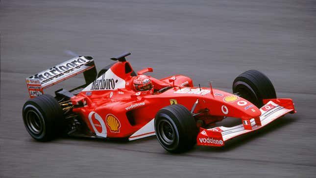 A photo of a red Ferrari F1 car from 2002. 