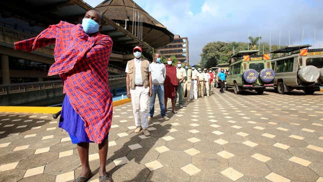 Kenyan tour guides and travel operators queue to receive the AstraZeneca/Oxford vaccine against Covid-19.
