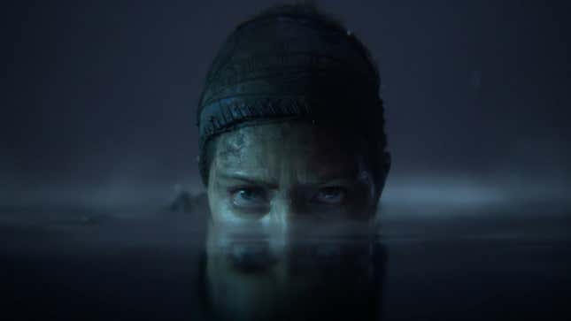 Senua stealths through a body of water, just the top of her head poking out, in Senua's Saga: Hellblade II.