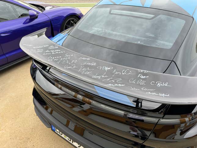 Signed rear wing of a 2024 Porsche Taycan Turbo GT