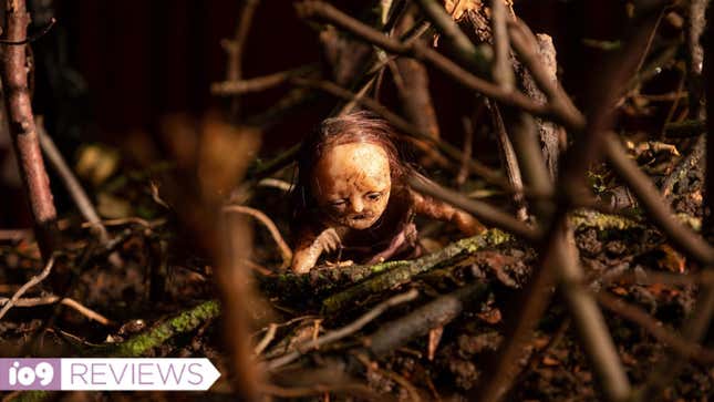 A stop-motion figure in a forest scene