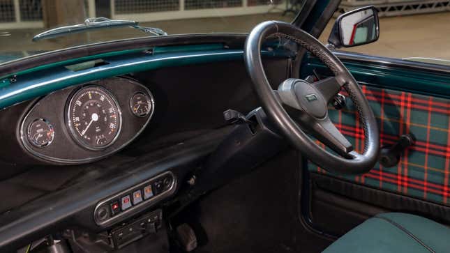 Image for article titled This Gauge Alone Makes The Classic Mini EV An Instant Winner