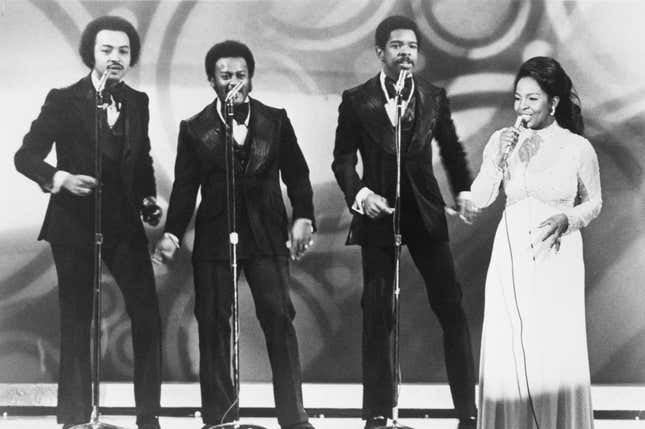 Musical group Gladys Knight and the Pips performing on stage in 1974.