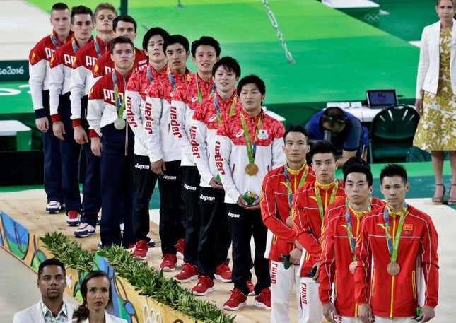 Japan wins gold in the men’s artistic gymnastics team event.