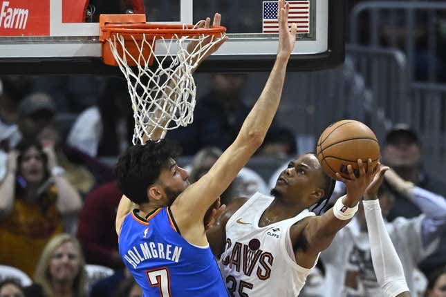 Oct 27, 2023; Cleveland, Ohio, USA; Cleveland Cavaliers forward Isaac Okoro (35) moves against Oklahoma City Thunder forward Chet Holmgren (7) in the second quarter at Rocket Mortgage FieldHouse.