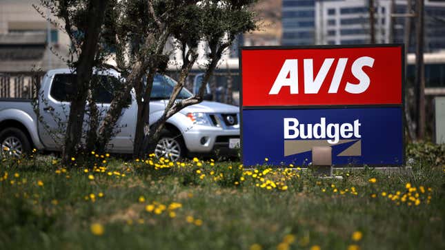 An Avis/Budget rental sign