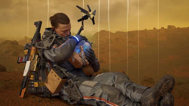 Death Stranding protagonist Sam Porter Bridges sits on the ground while holding a BB in his arms. 