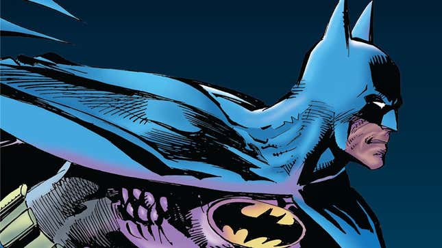 Batman, in his blue and gray costume, lunges forcefully to the right.