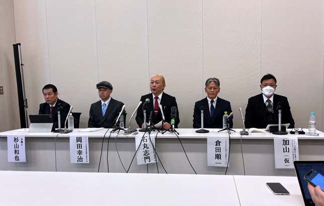 Lawyer Kazuya Sugiyama, right, and Shimon Ishimaru, center, who represents the victims&#39; group, speaks to reporters as he sits with three other victims who came forward alleging they were sexually abused as boys by Japanese entertainment mogul Johnny Kitagawa during a news conference at the government parliamentary buidling in Tokyo, Monday Jan. 15, 2024. Members of a group of men who say they were sexually abused as boys by Kitagawa are accusing the company behind the scandal, previously known as Johnny&#39;s, of not being sincere in dealing with the victims. (AP Photo/Yuri Kageyama)