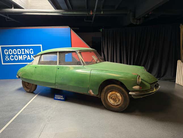 Side view of a green barn find 1960 Citroën ID19