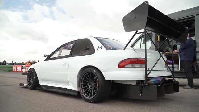 Image for article titled This 850 HP Subaru 22B Hillclimber Has More Wing Than A Flock Of Geese