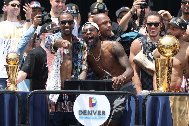 DENVER, COLORADO - JUNE 15: Kentavious Caldwell-Pope #5 and Jeff Green #32 speak during the Denver Nuggets victory parade and rally after winning the 2023 NBA Championship at Civic Center Park on June 15, 2023 in Denver, Colorado. NOTE TO USER: User expressly acknowledges and agrees that, by downloading and or using this photograph, User is consenting to the terms and conditions of the Getty Images License Agreement. (Photo by Matthew Stockman/Getty Images)