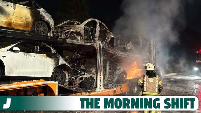 A photo of a burned out trailer of electric cars/ 