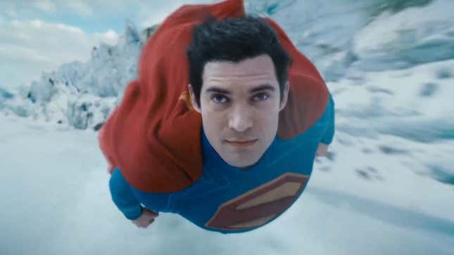 Superman flies toward the camera, surrounded by ice, his eyes looking slightly in two directions.