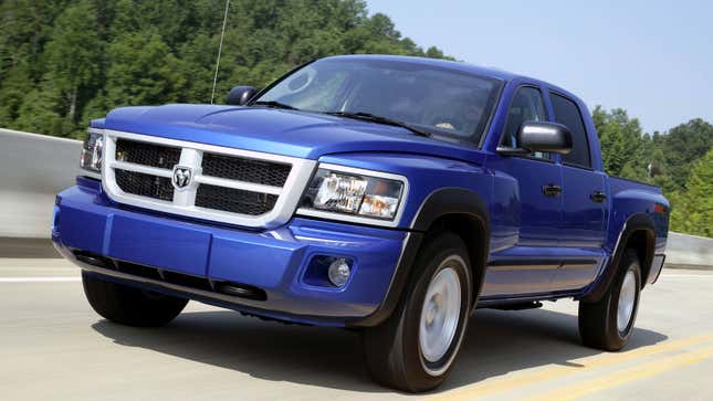 A blue Dodge Dakota pickup truck. 