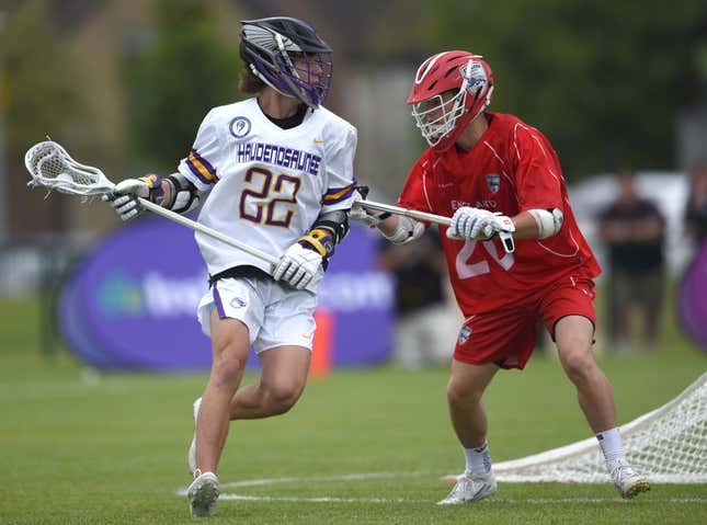 Koleton Marquis of Haudenosaunee and Daniel Flisk of England during the 2022 World Lacrosse Men’s U21 World Championship