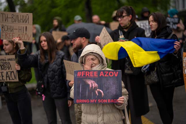 People attend a rally aiming to raise awareness on the fate of Ukrainian prisoners of war in Kyiv, Ukraine, Sunday, April 21, 2024. The U.S. House of Representatives swiftly approved $95 billion in foreign aid for Ukraine, Israel and other U.S. allies in a rare Saturday session as Democrats and Republicans banded together after months of hard-right resistance over renewed American support for repelling Russia&#39;s invasion. (AP Photo/Francisco Seco)