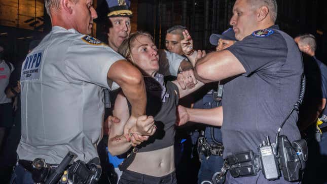 New York Police Department officers arrest an abortion rights activist in New York, on June 24, 2022.