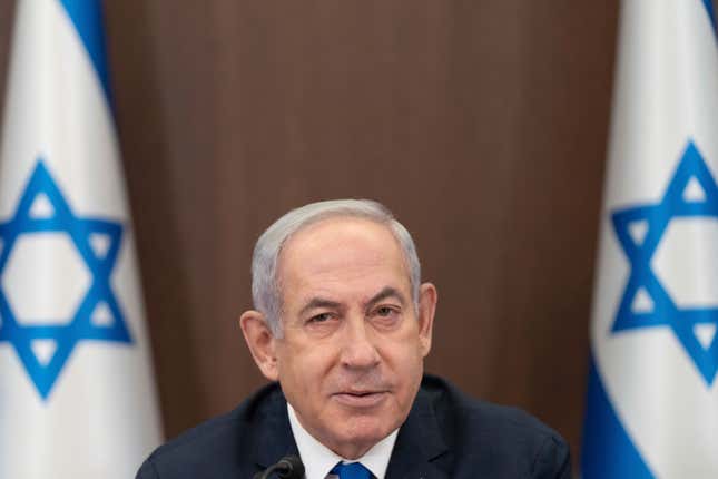 FILE - Israeli Prime Minister Benjamin Netanyahu, chairs the weekly cabinet meeting in Jerusalem, Sunday, Sept. 10, 2023. Israeli Prime Minister Benjamin Netanyahu&#39;s office says he will meet billionaire businessman Elon Musk during a trip to the United States. Netanyahu’s office declined to discuss the agenda for the meeting on Monday, Sept. 18, 2023. But it comes at a time that Musk is facing accusations of tolerating antisemitic messages on his social media platform X, formerly known as Twitter. (AP Photo/Ohad Zwigenberg, Pool, File)