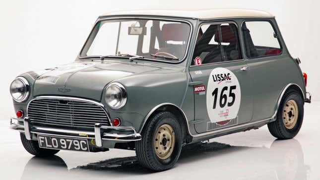 A photo of a grey Mini Cooper. 